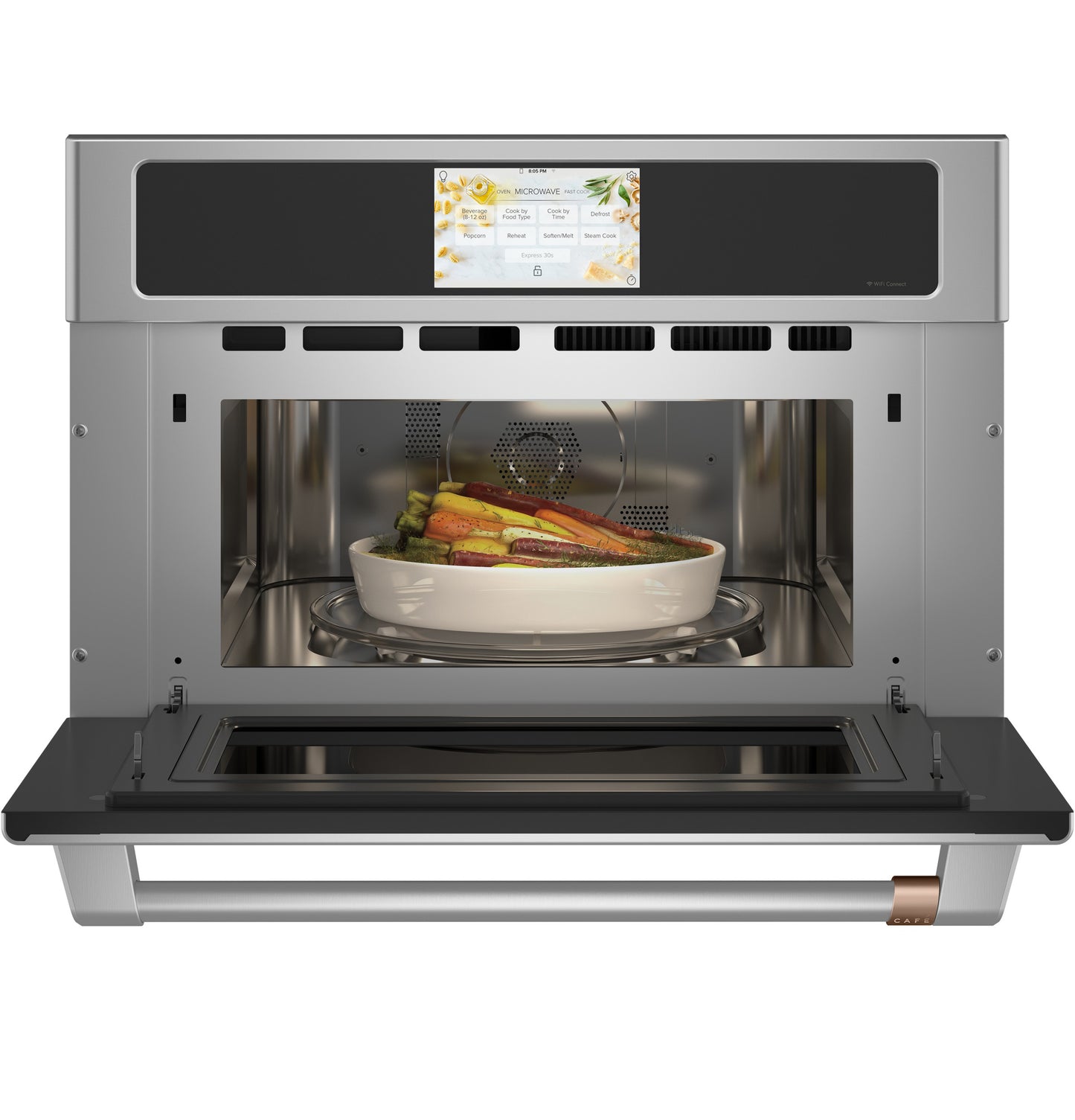Stainless steel built-in microwave convection oven with digital touchscreen and dish of roasted vegetables inside