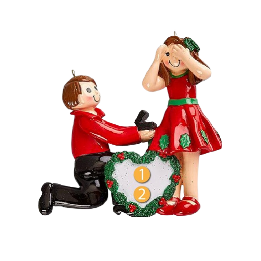 Ornament of man proposing on one knee to woman in red dress with Christmas wreath from holiday tree decorations collection
