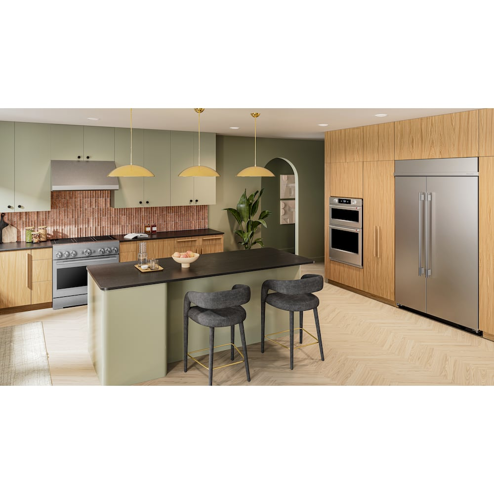 Modern kitchen featuring built-in smart electric combo wall oven and stainless steel refrigerator with wood cabinetry