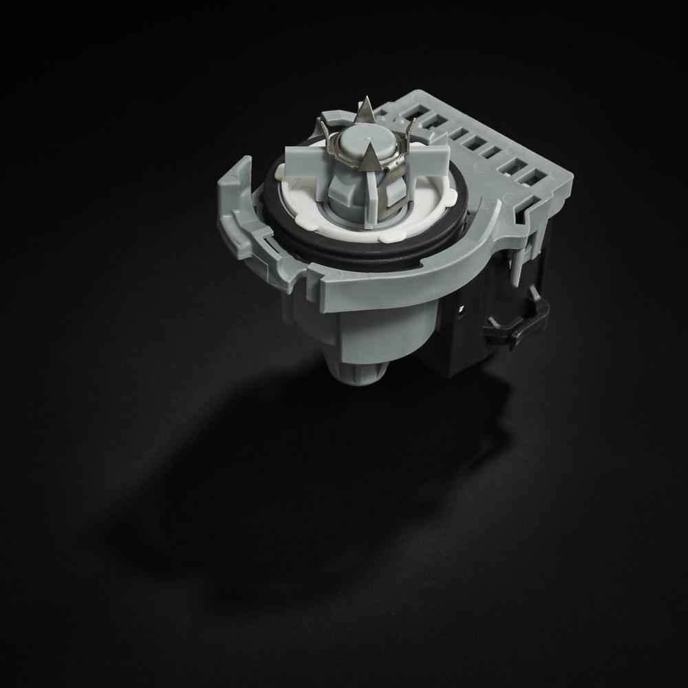 Close-up of a dishwasher component part highlighting the spray arm assembly for kitchen appliance maintenance and repair