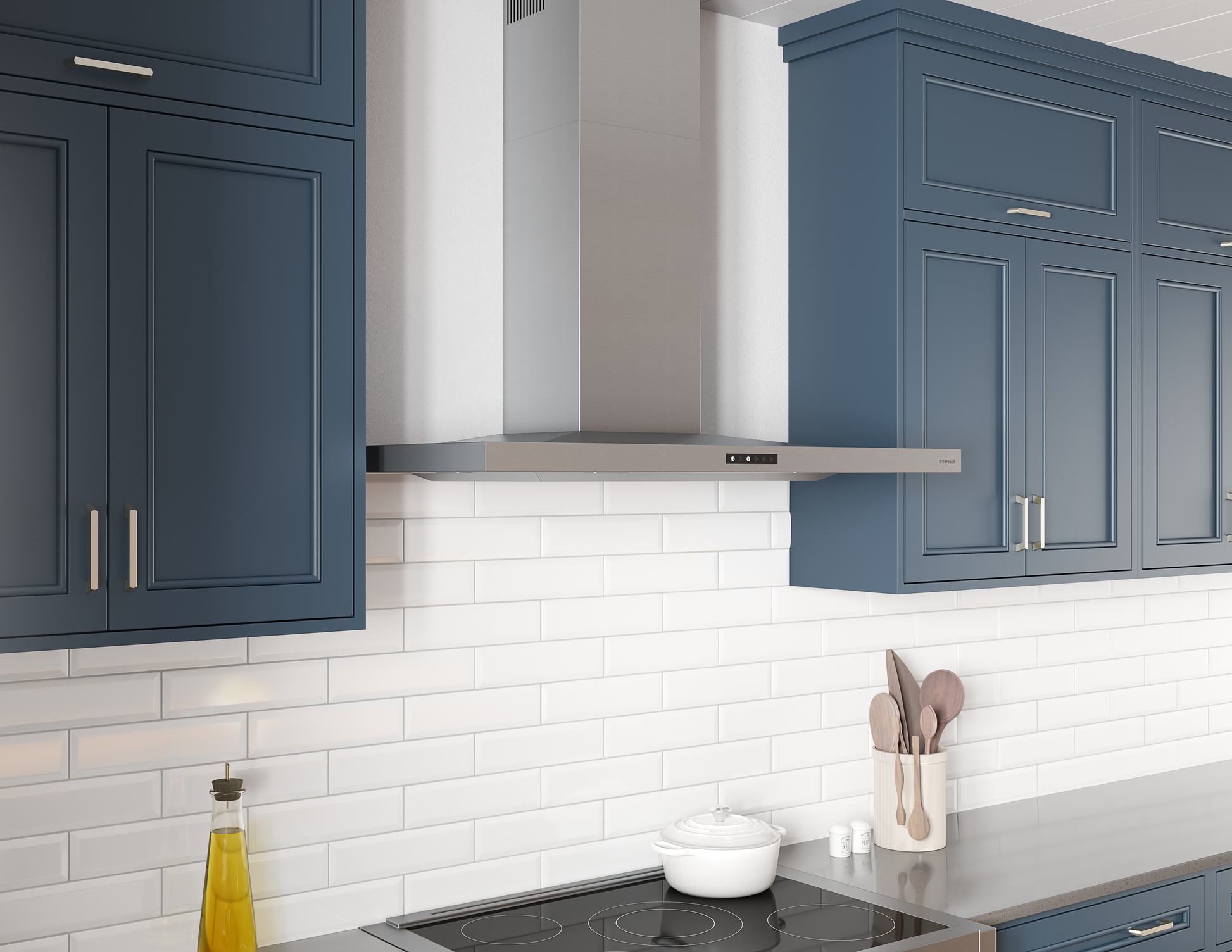 Stainless steel wall-mounted range hood with clean lines and sleek modern design in kitchen with blue cabinetry and white subway tile