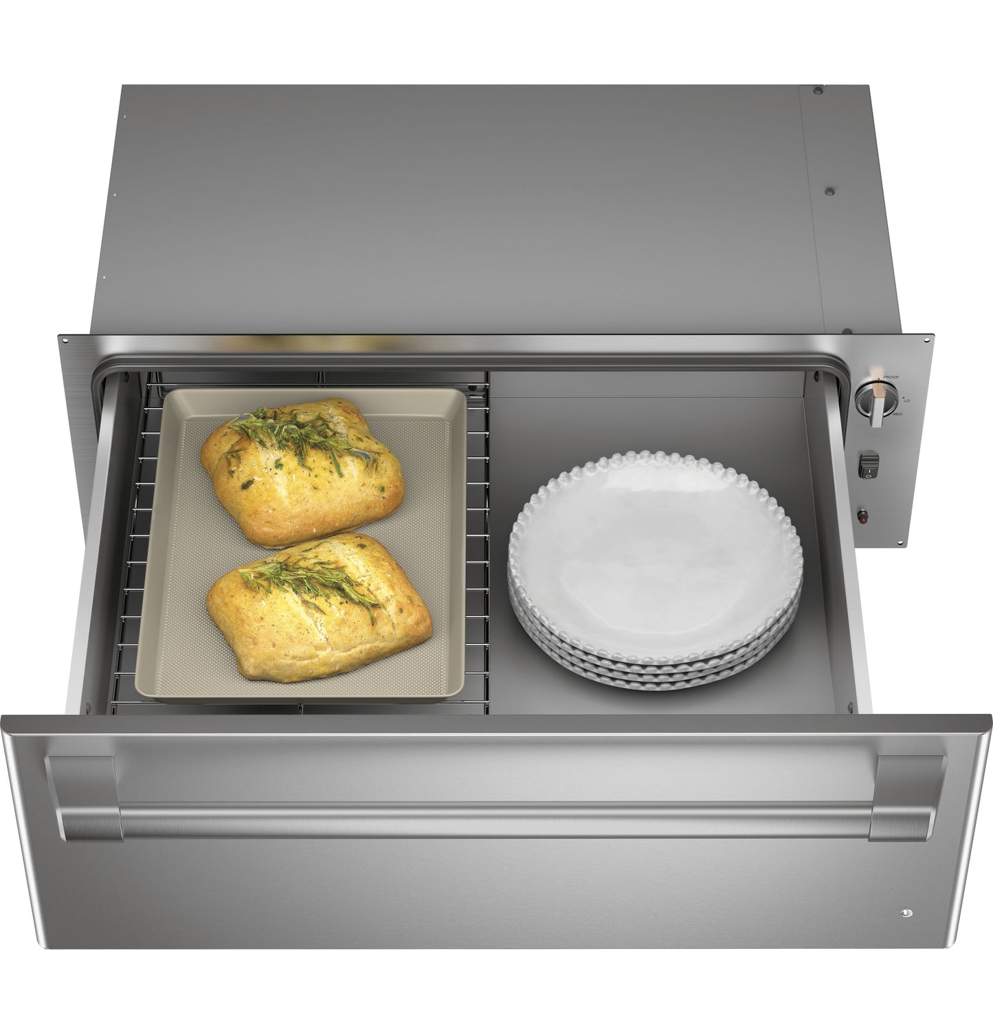 Stainless steel warming drawer with bread and stacked plates inside, part of kitchen appliances and wall ovens collection