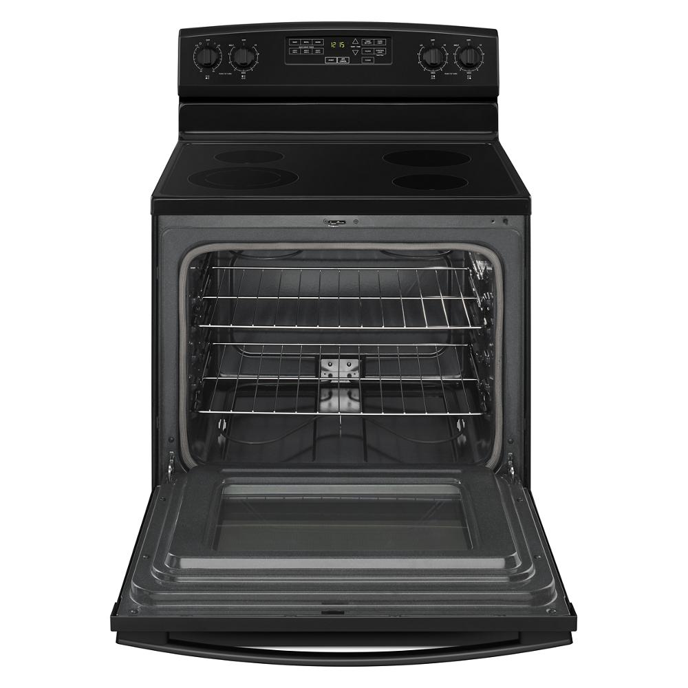 Open electric range oven with racks shown, featuring a smooth cooktop and digital control panel from kitchenware collection