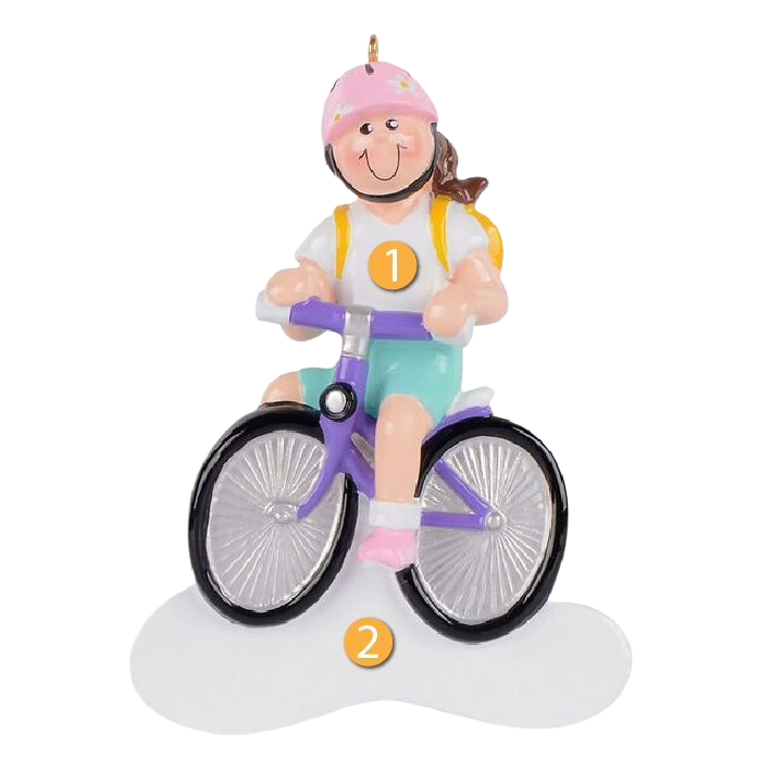 Personalized ornament of a smiling brunette girl wearing a pink helmet riding a purple bike for Christmas décor under $50