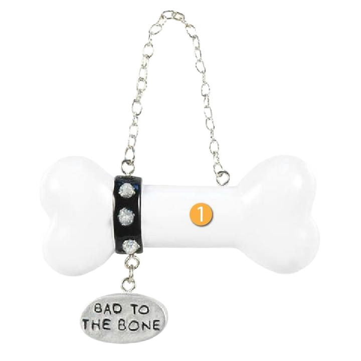 White bone-shaped Christmas ornament with black rhinestone collar and "Bad to the Bone" tag under 50 dollars