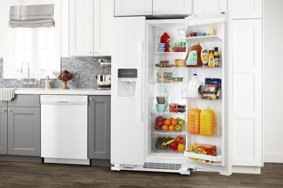 white 36-inch side-by-side refrigerator with dual pad external ice and water dispenser in modern kitchen setting