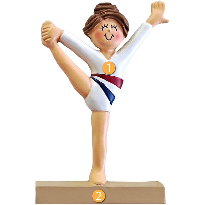 Brunette female gymnast figurine in white leotard with red and blue stripes performing a balance pose Christmas ornament under $50