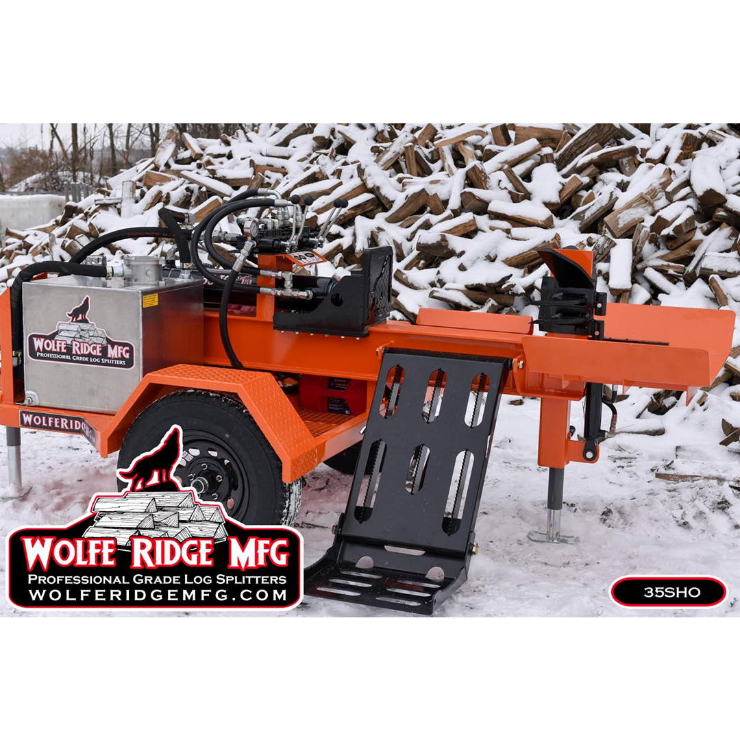 Orange Wolfe Ridge 35 Ton SHO commercial log splitter with hydraulic components outdoors near snow-covered firewood pile