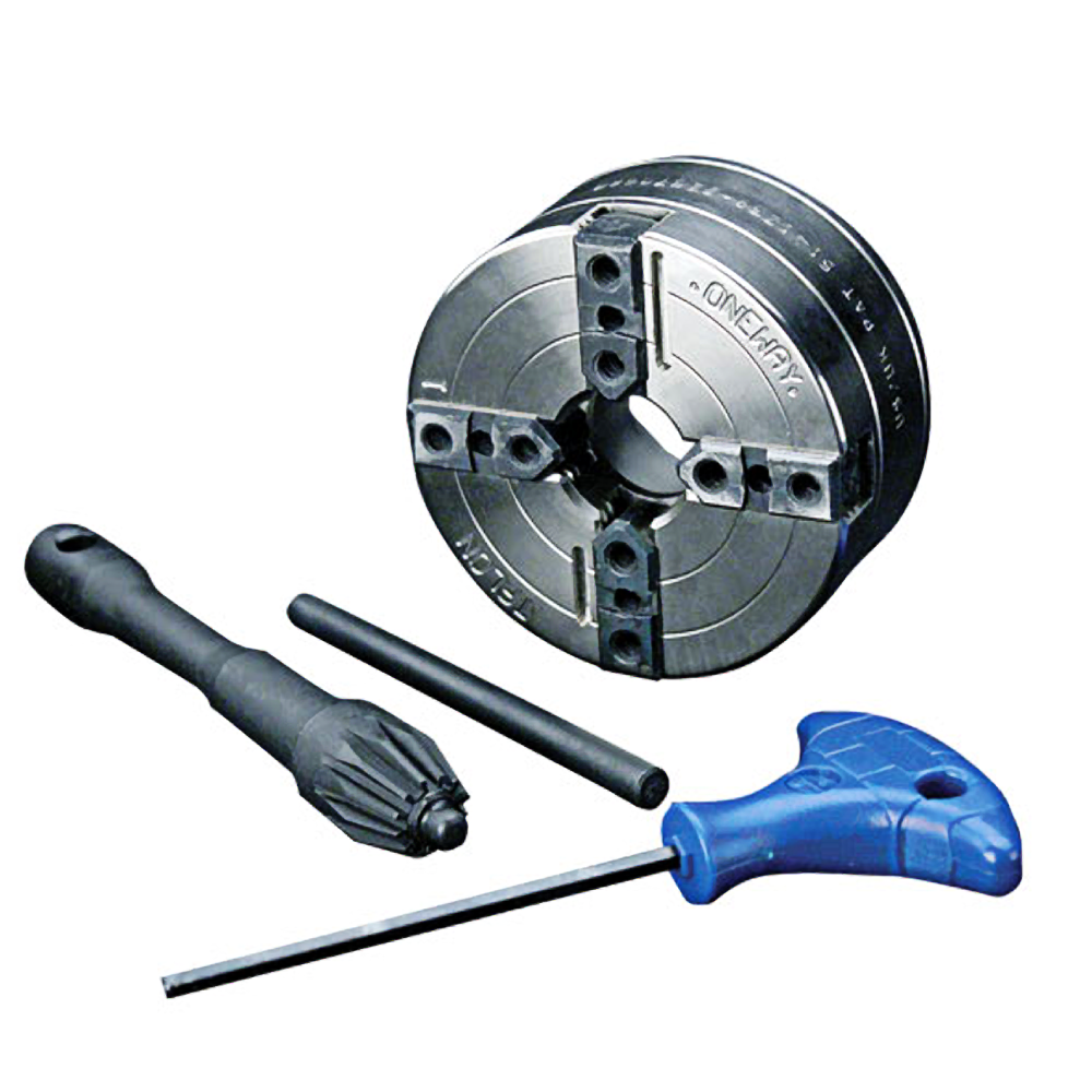Metal lathe chuck with key and hex screwdriver tools for precision woodworking and tool maintenance collection