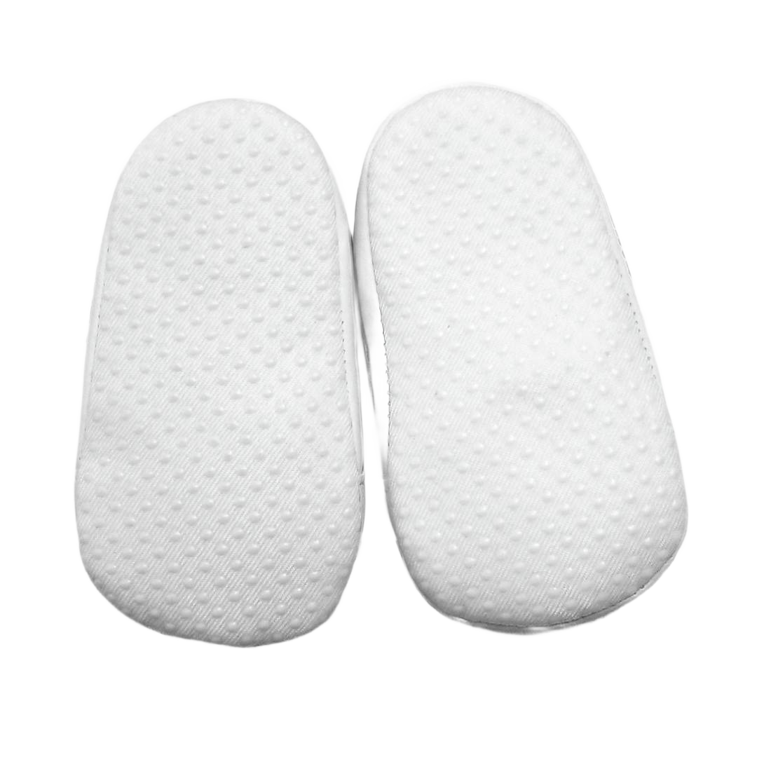Soft white textured sole pre-walker baby shoes designed for comfort and early walking support