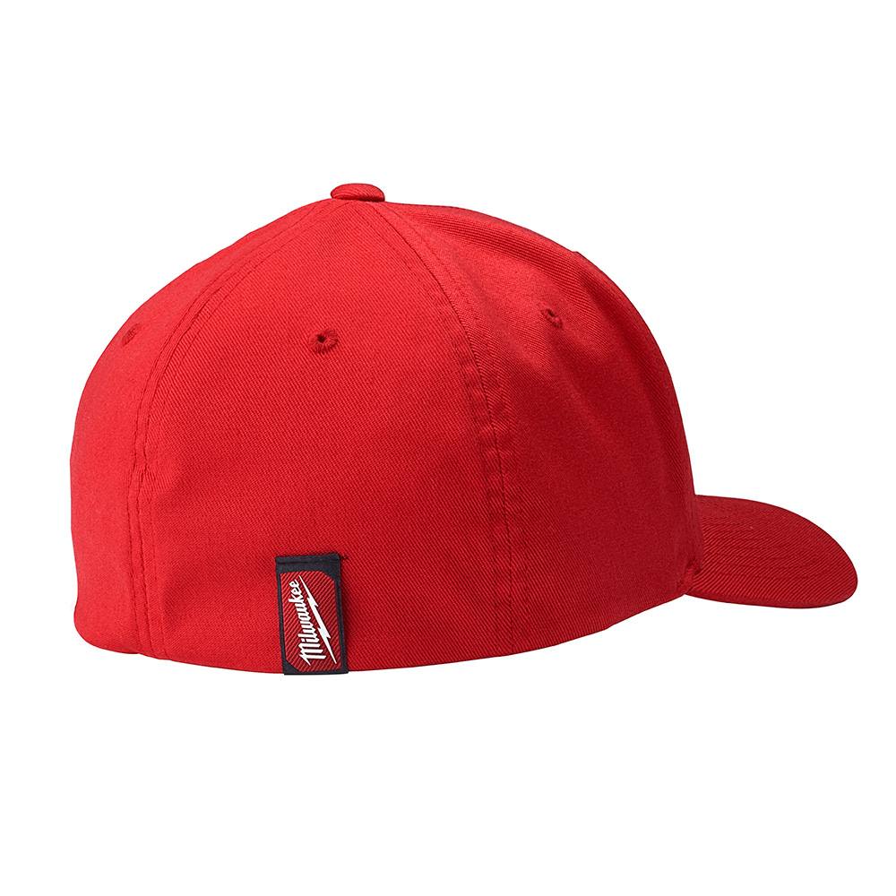 Red fitted hat with structured crown and small black woven brand tag for casual outdoor use