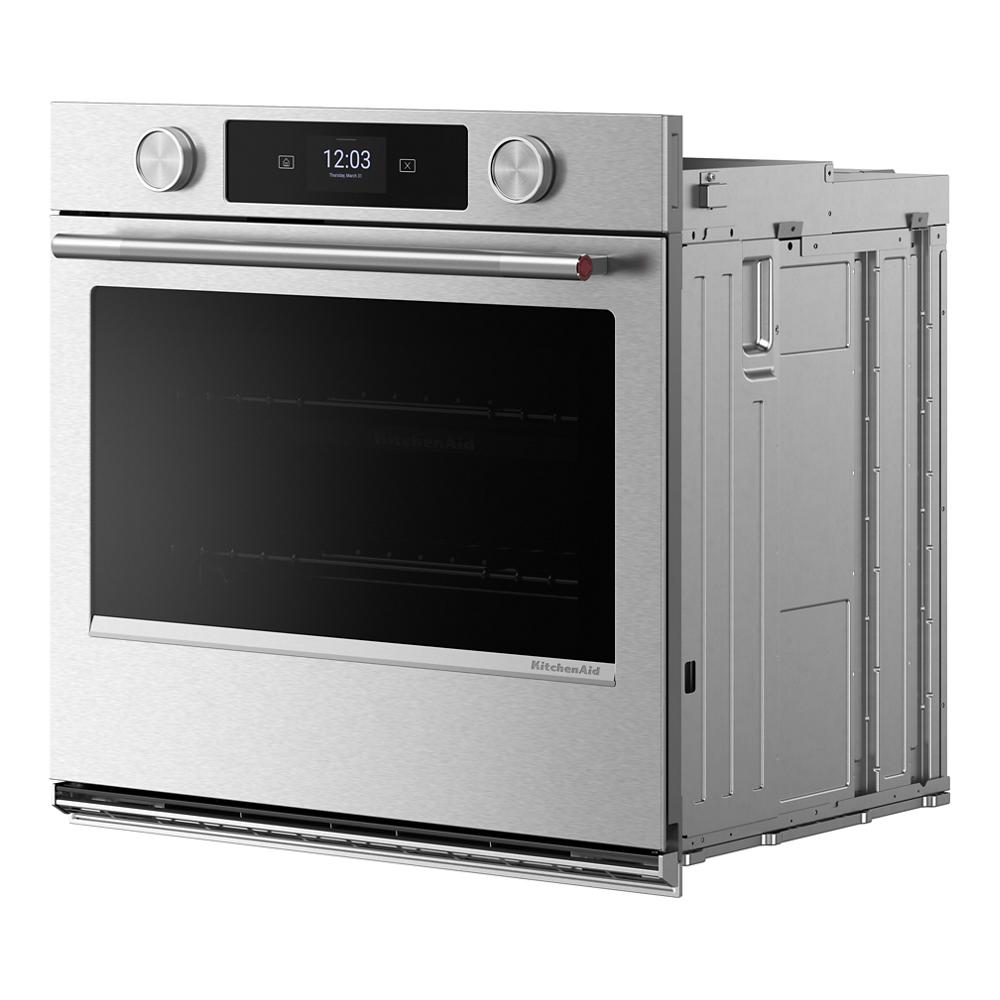 Stainless steel 27-inch smart electric single wall oven with LED touchscreen and backlit knobs in KitchenAid appliances collection