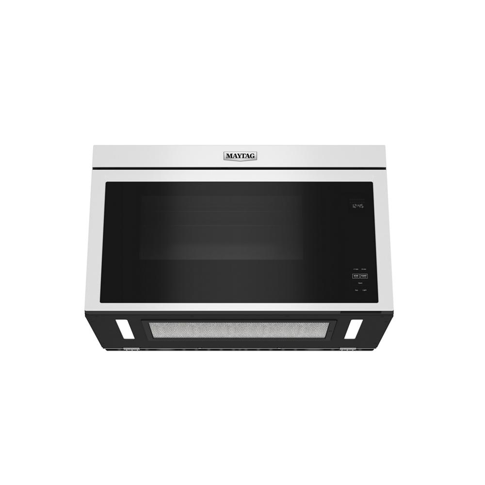 Over-the-range built-in microwave with black glass door, digital controls, and stainless steel trim from Appliances collection