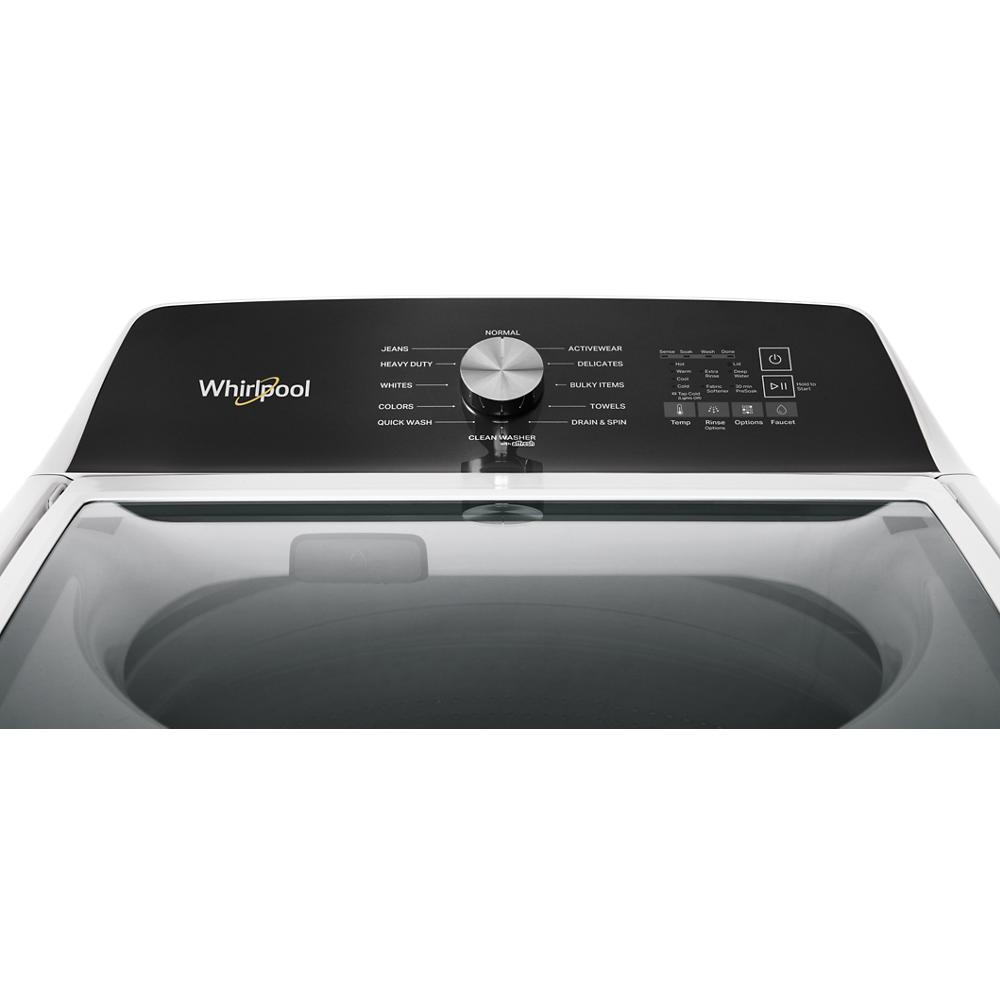 Black control panel of top load washer with cycle selector knob and digital settings for home appliance use