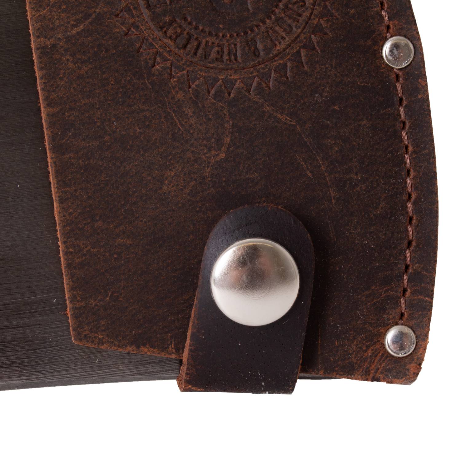 Close-up of brown leather sheath with metal snap button and rivets on outdoor and woodworking hand tools accessory