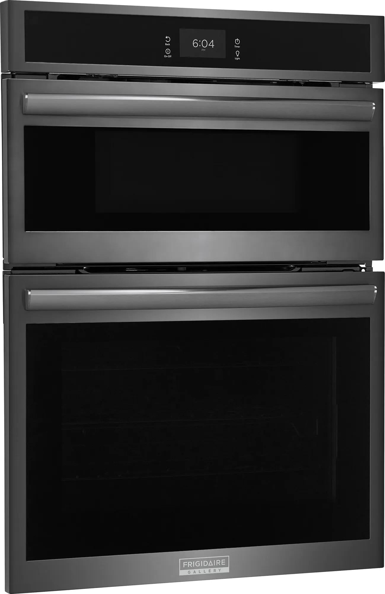 Black stainless steel built-in microwave and electric wall oven combination with digital clock display and sleek horizontal handles