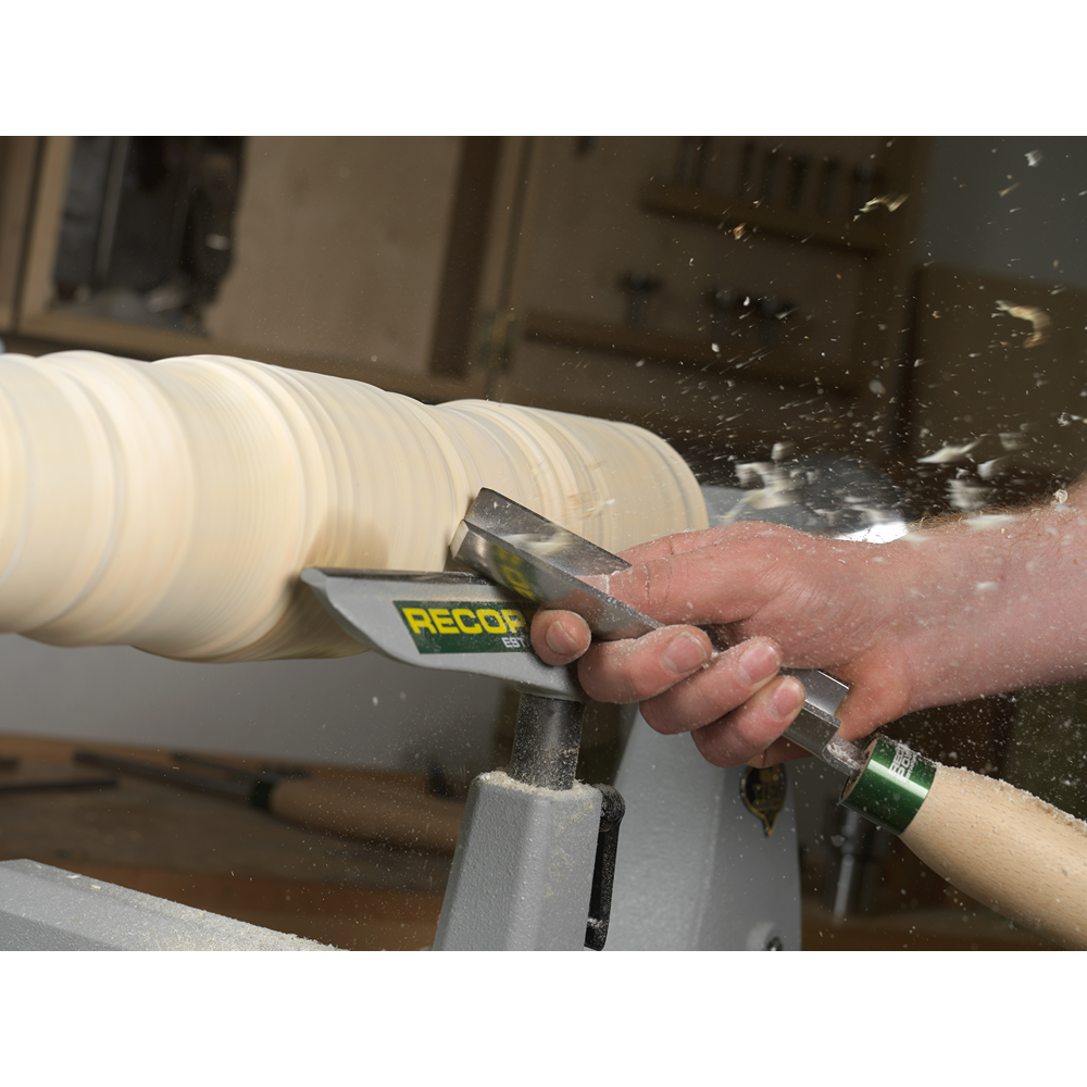 Wood lathe roughing gouge with ergonomic handle in use for fast material removal on woodworking tools under $100 collection