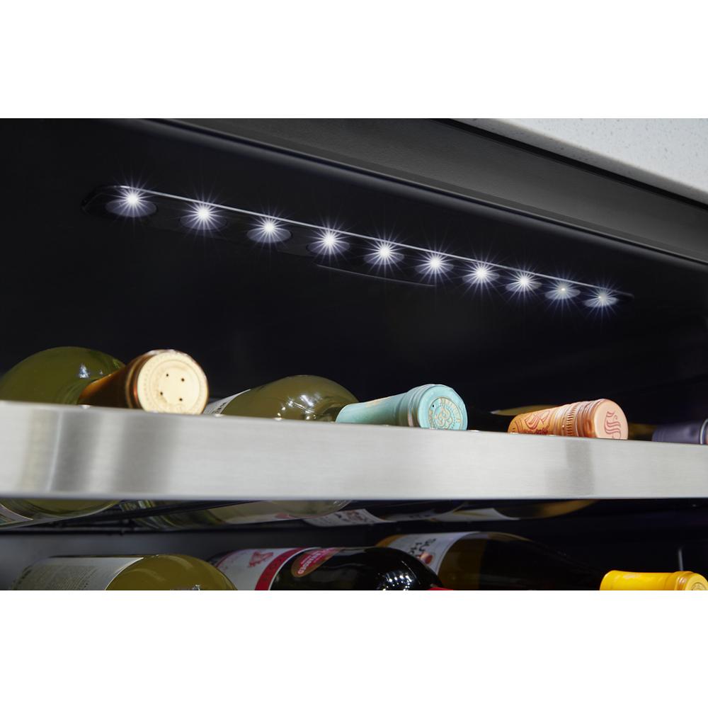 LED lighting illuminating wine bottles inside a stainless steel undercounter wine cooler from Refrigerators collection