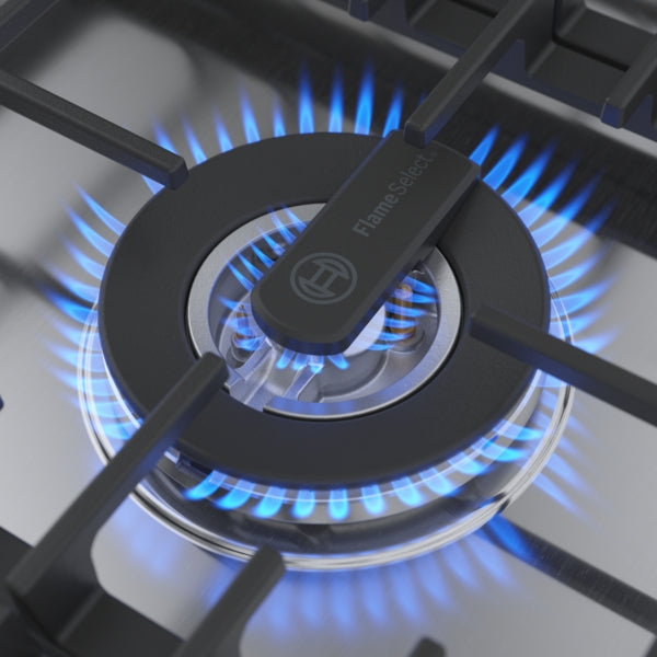 Close-up of blue flame burning on high-quality stainless steel gas burner with black cast iron grate from Bosch cooktops collection