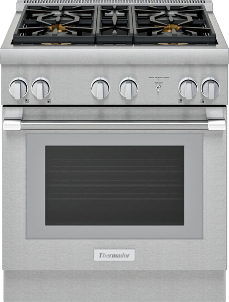 Freestanding stainless steel dual fuel range with six control knobs and large glass oven door in Thermador collection