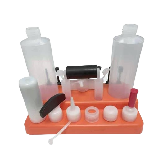Professional gluing bottle and accessory kit with multiple nozzles and caps for precise application in home improvement tools