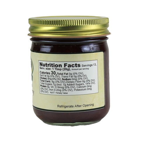 Jar of fruit sweetened red raspberry spread with nutrition facts label from Hartville Kitchen jams and jellies collection