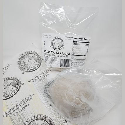 Package of whole grain wheat raw pizza dough with nutrition facts label in food and beverage collection