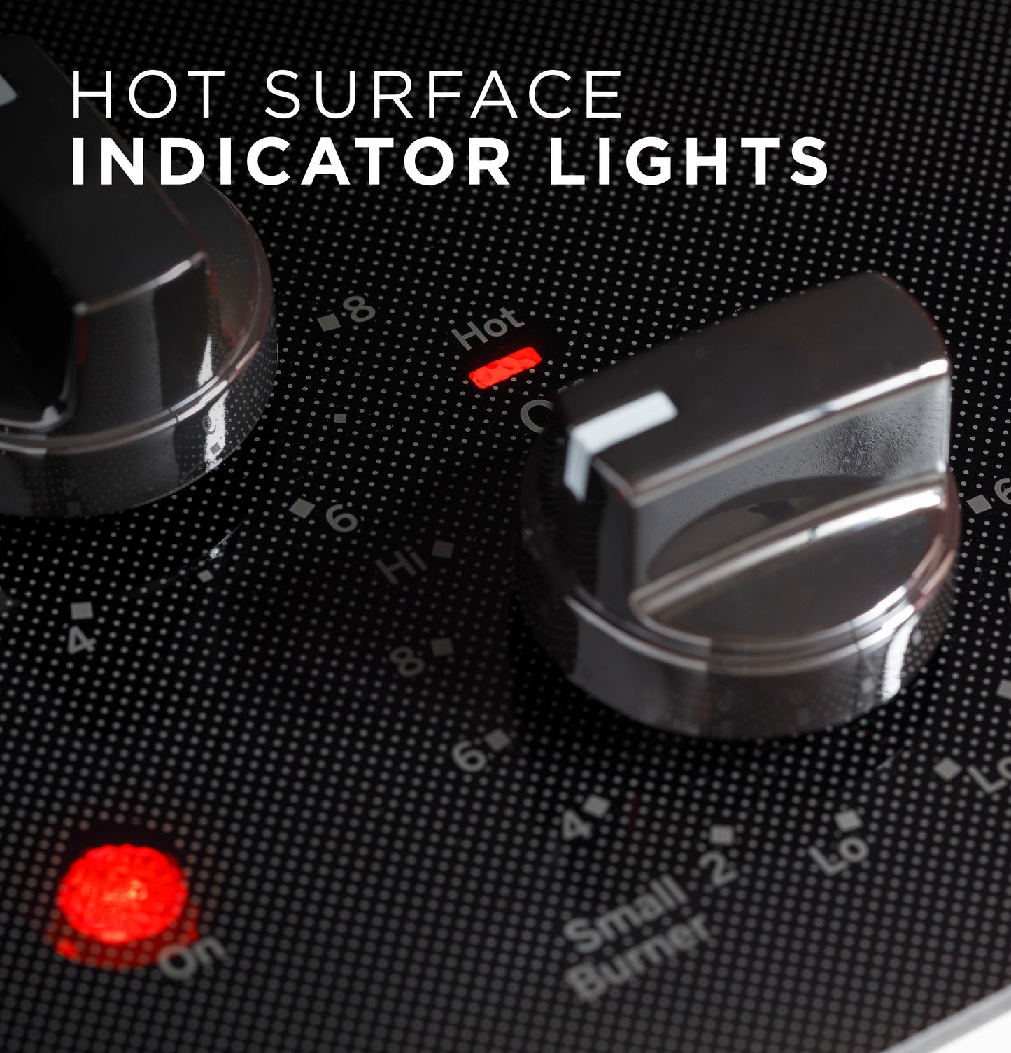 Close-up of black cooktop knobs with illuminated red hot surface and power indicator lights in kitchen appliance setting