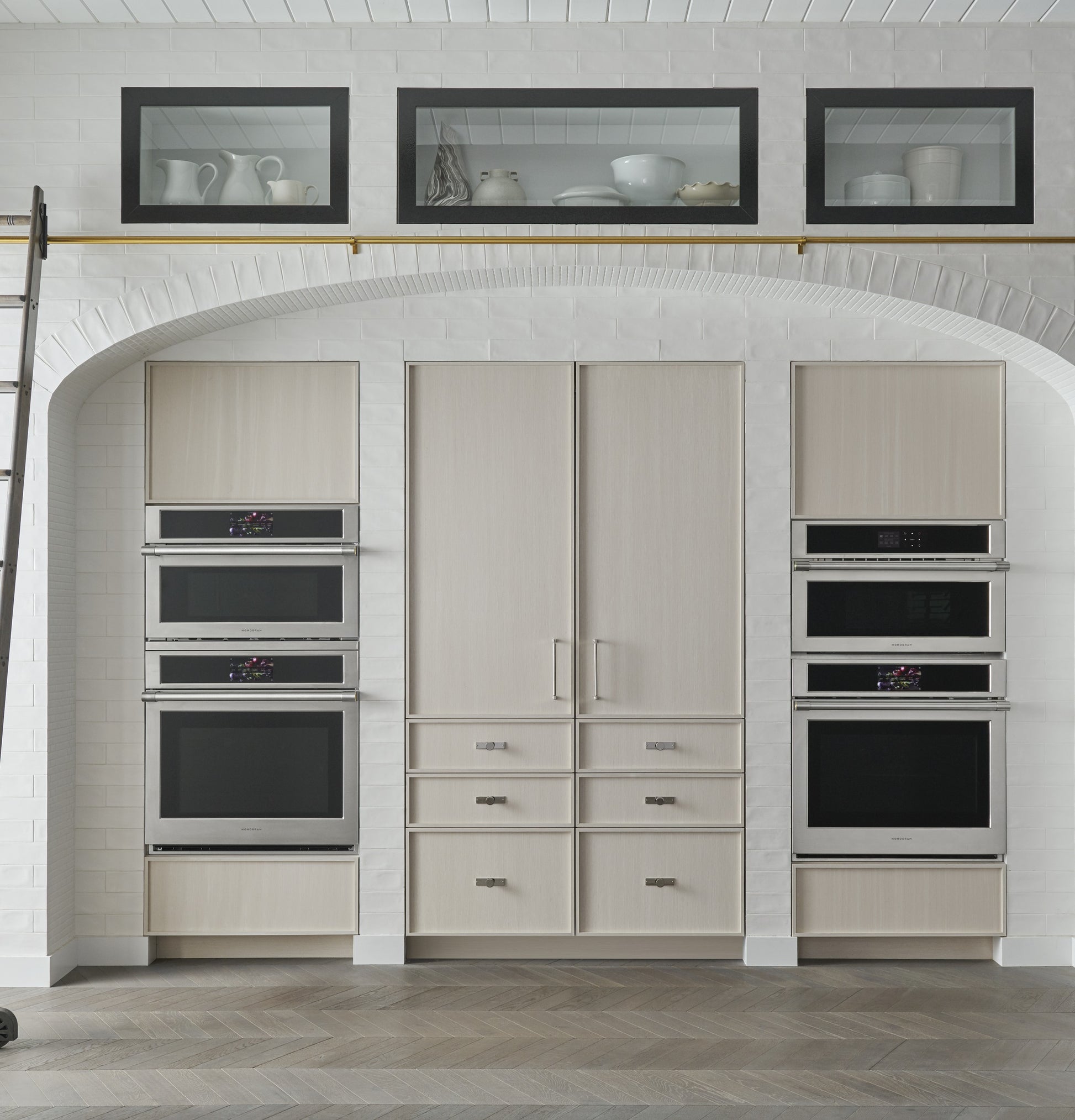 Modern kitchen wall ovens installation featuring built-in steam oven and sleek light wood cabinetry in kitchen appliances collection