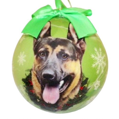 Green Christmas ball ornament featuring a German Shepherd dog wearing a festive wreath and topped with a green ribbon bow