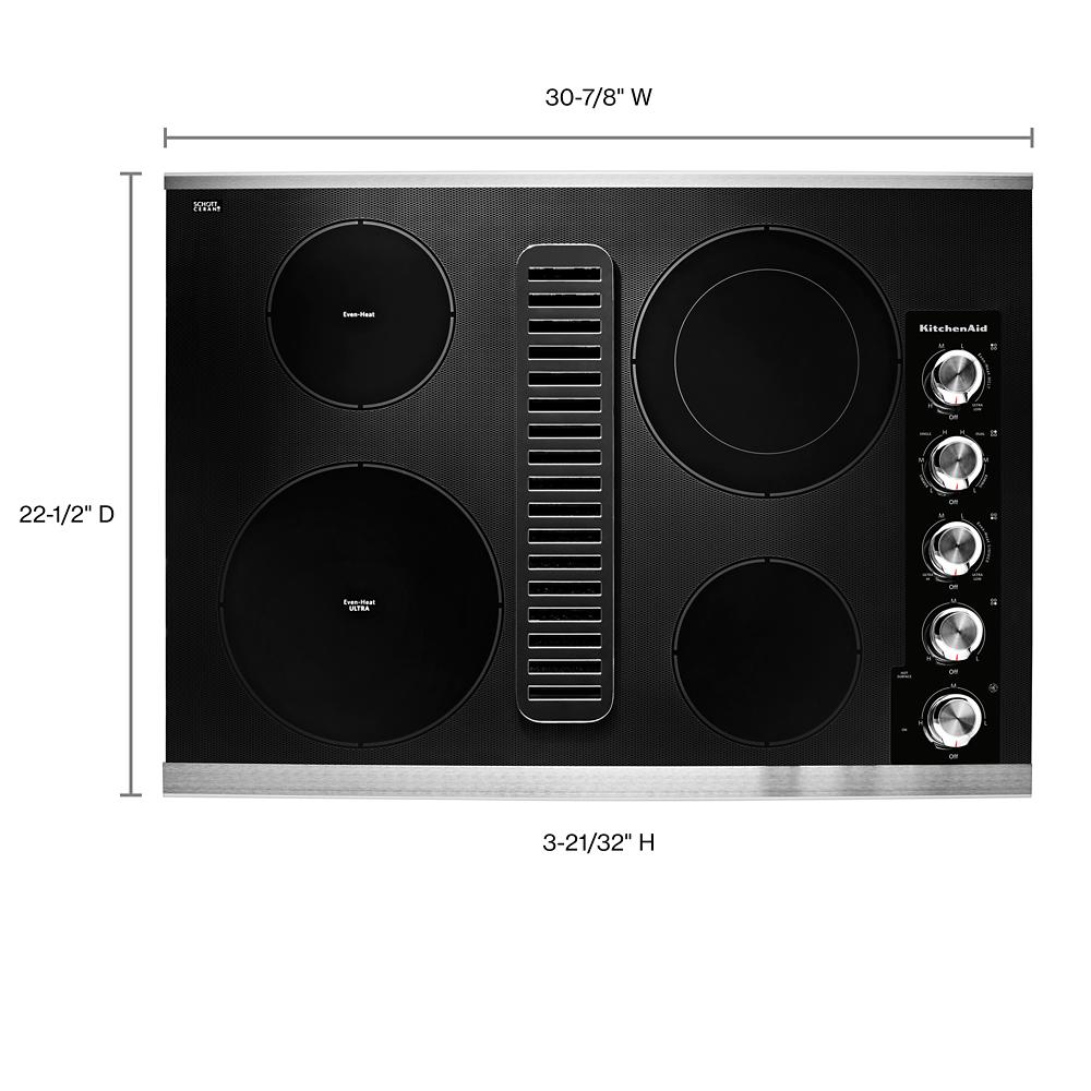 Black electric cooktop with four elements and integrated downdraft ventilation in KitchenAid cooktops collection