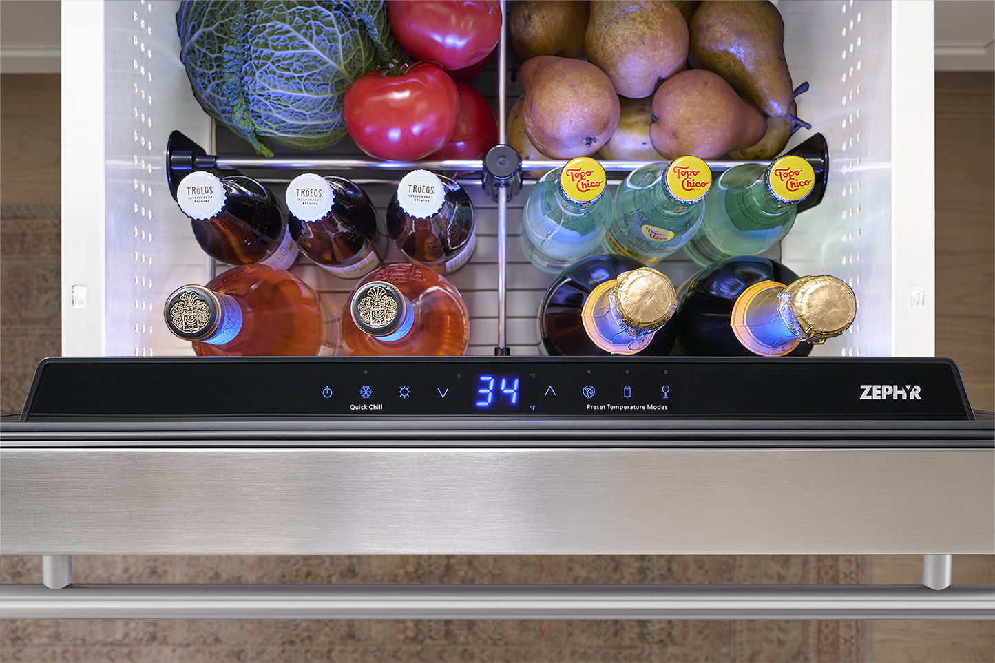 Under-counter stainless steel refrigerator drawer with chilled drinks, produce, and digital temperature display for kitchen use