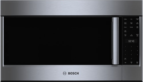 Stainless steel over-the-range microwave with left side-opening door and digital control panel in kitchen appliances collection