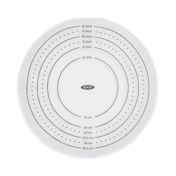 Round silicone dough rolling mat with measurement guides in inches and centimeters for precise baking in kitchenware collections