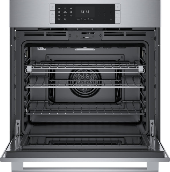 Open stainless steel single wall oven showing multiple racks and digital control panel from Bosch appliances collection