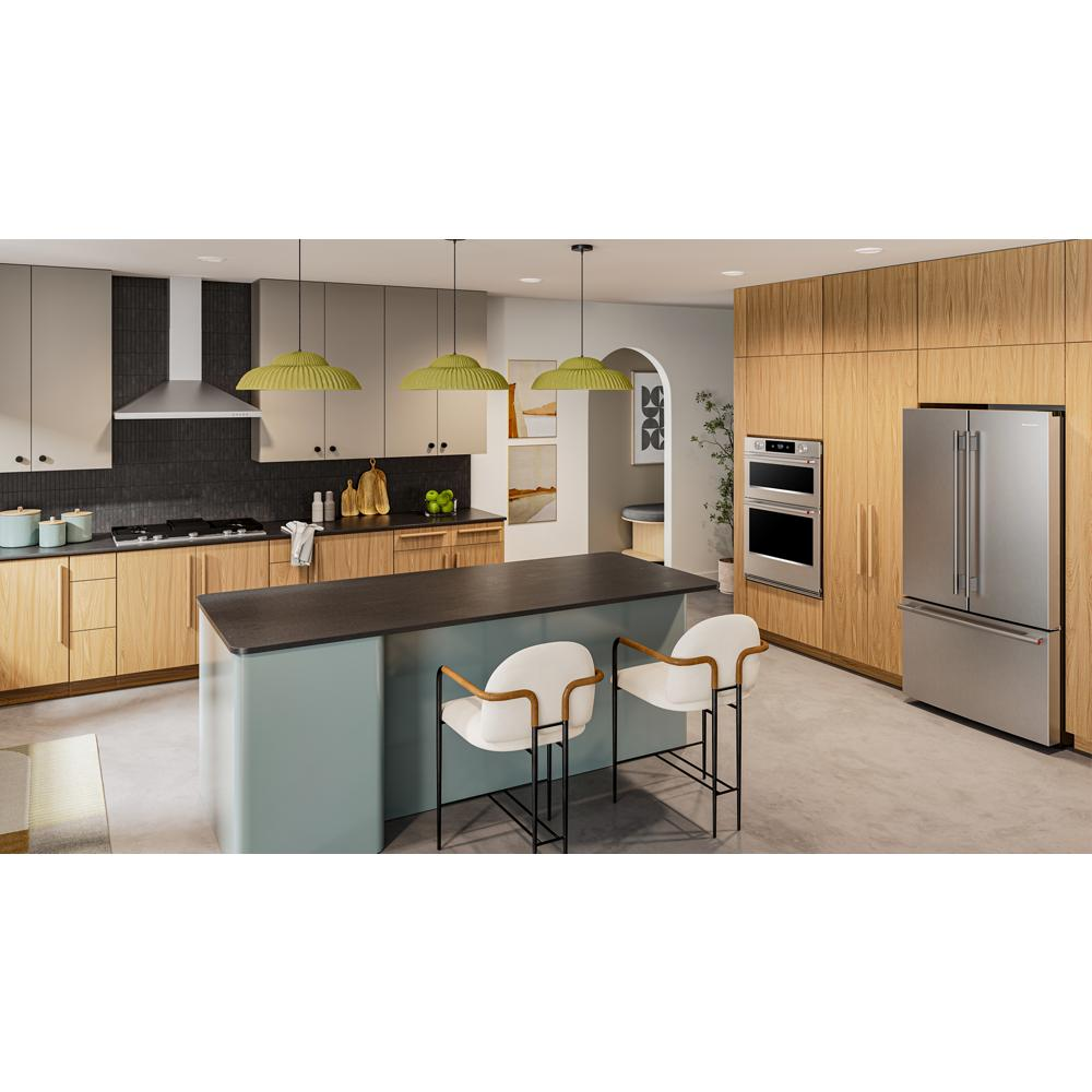 Modern kitchen with wood cabinetry, stainless steel wall-mount canopy hood, and matte black countertop island with bar stools