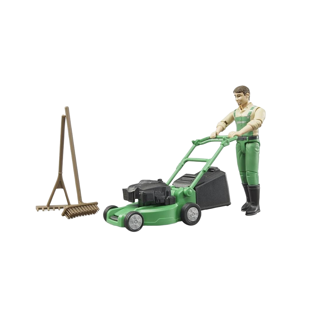Figurine dressed in green overalls pushing a green lawn mower with brown garden tools in toys and games collection