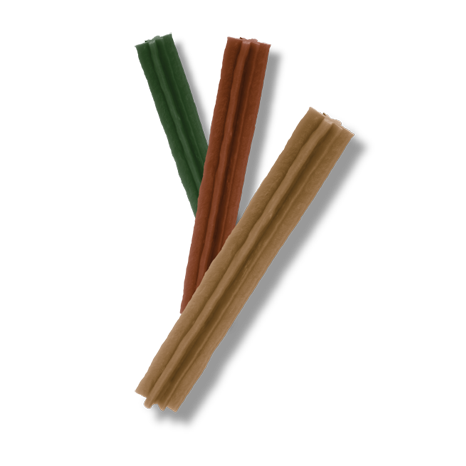 Three assorted dental dog chew sticks in green, brown, and beige colors against a plain background