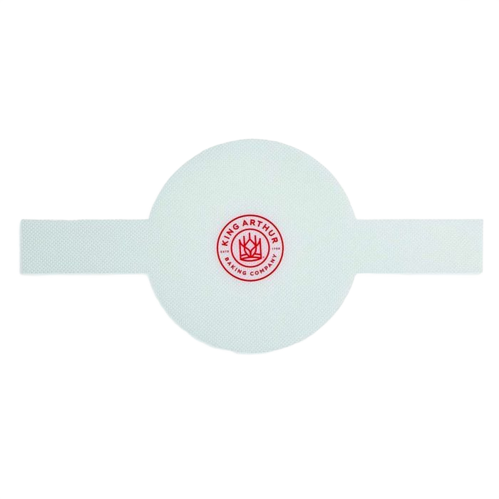 Round silicone loaf lifter with natural glass fibers and King Arthur Baking logo for kitchenware and bakeware collections