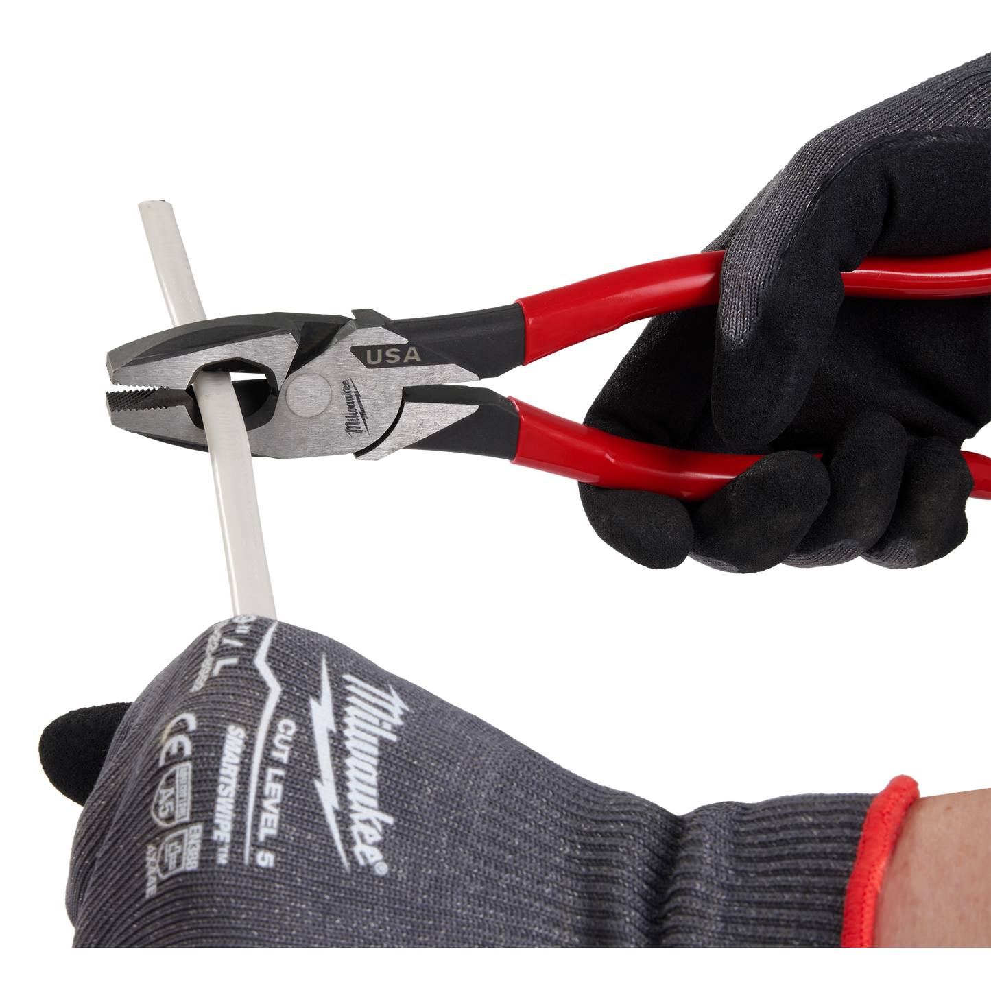 9-inch lineman pliers with red dipped handles gripping wire, worn with protective gloves for tools and home improvement tasks