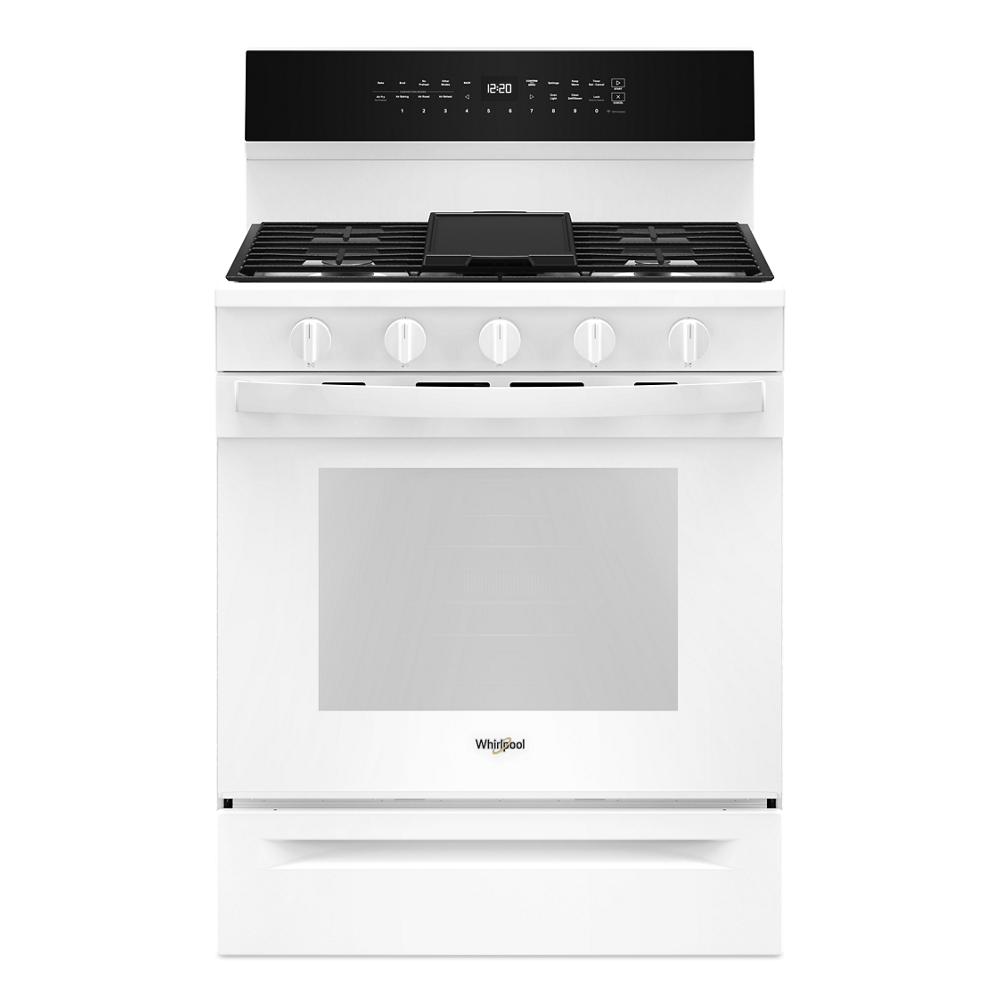 White freestanding 30-inch gas range with control knobs, digital display, and black cooktop grates from kitchen appliances collection