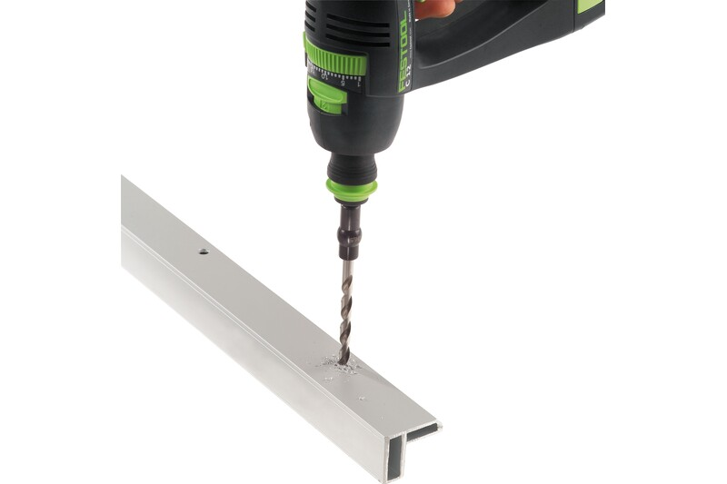 Cordless drill with a high-speed steel spiral bit drilling into metal for tool and home improvement projects