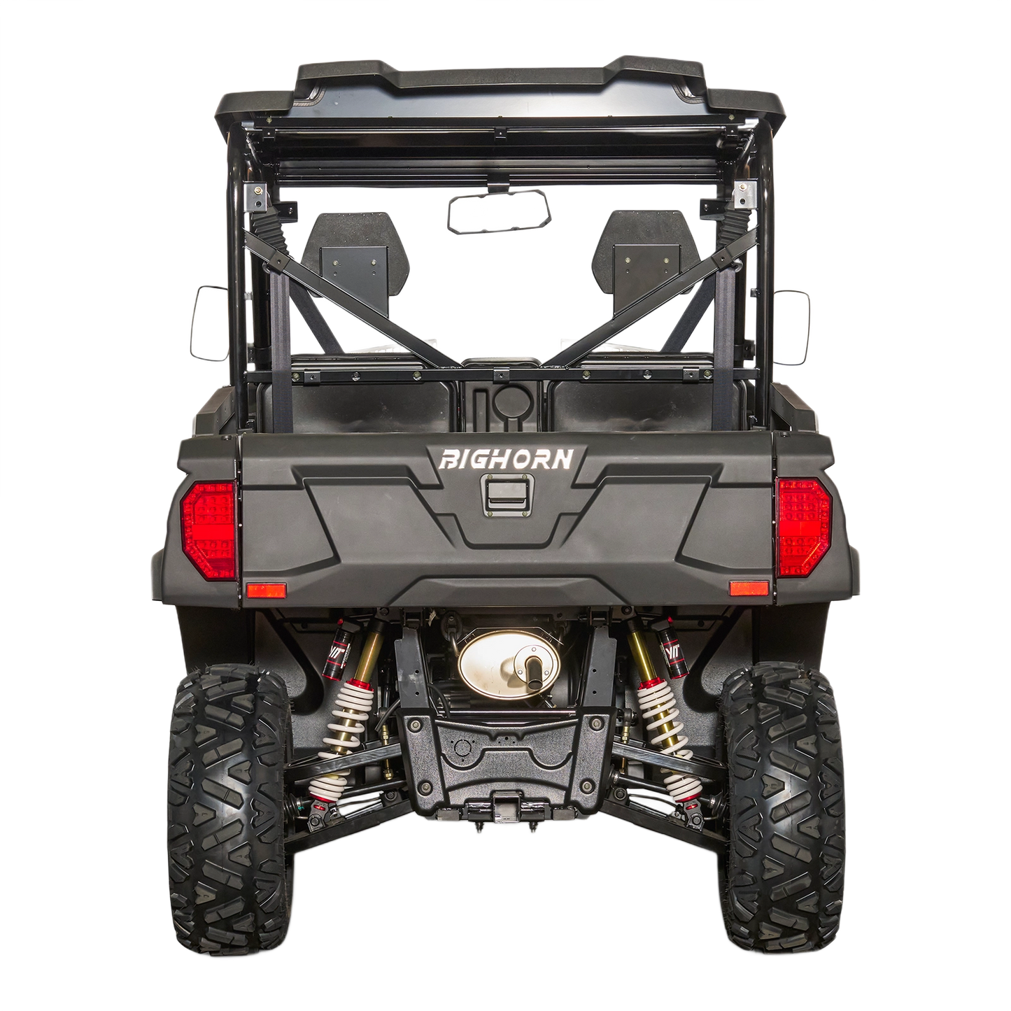 Rear view of black utility terrain vehicle with heavy-duty suspension and rugged tires for outdoor tools and home improvement tasks