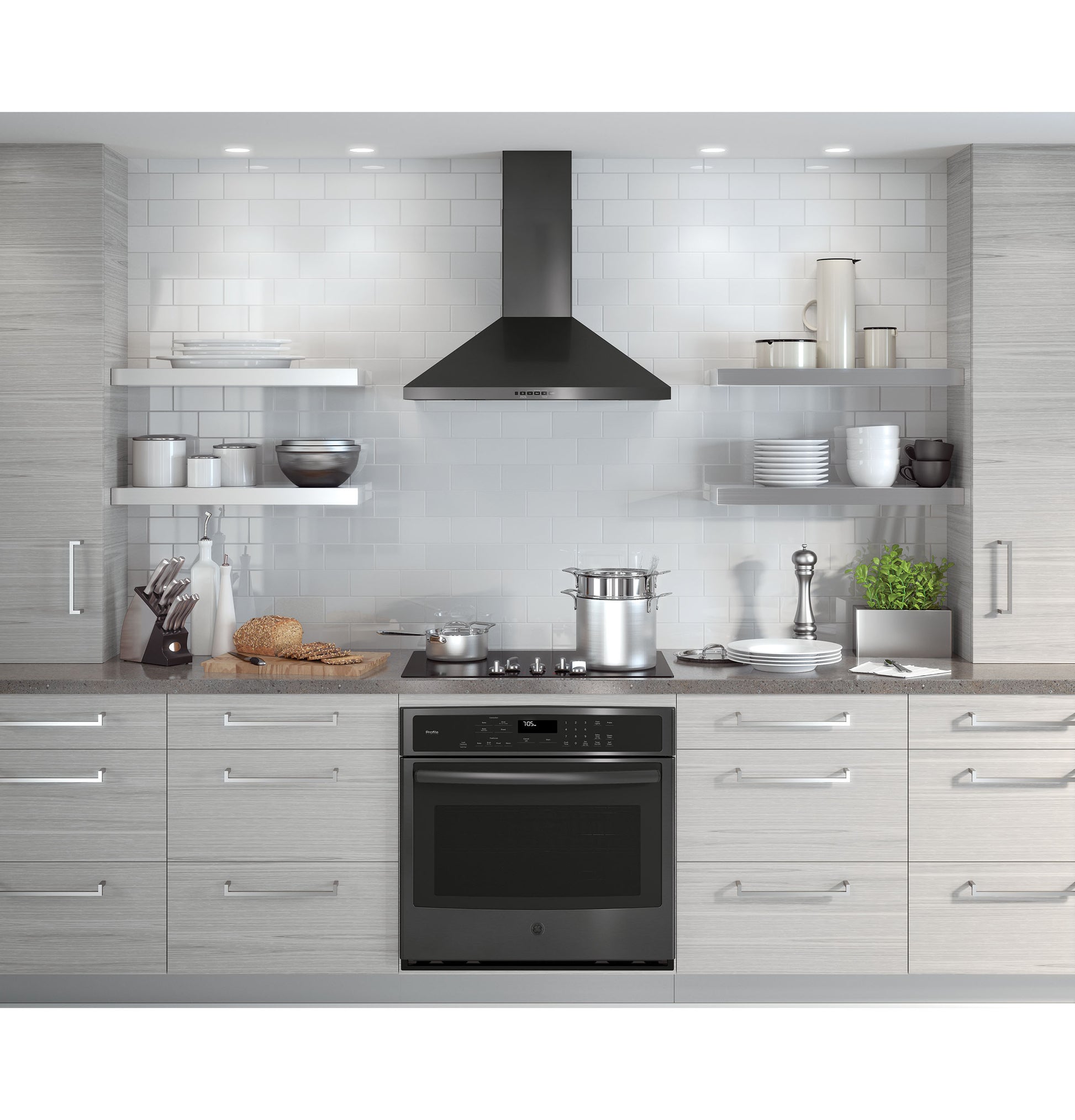 Modern kitchen featuring a black pyramid wall-mount chimney hood over a stainless steel stove in Appliances collection