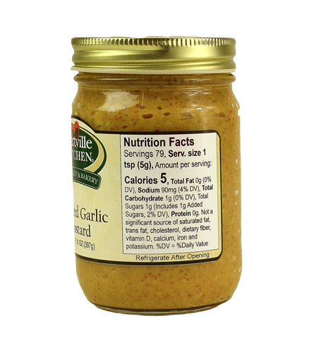 Glass jar of Hartville Kitchen roasted garlic mustard with gold metal lid in condiments under $50 collection