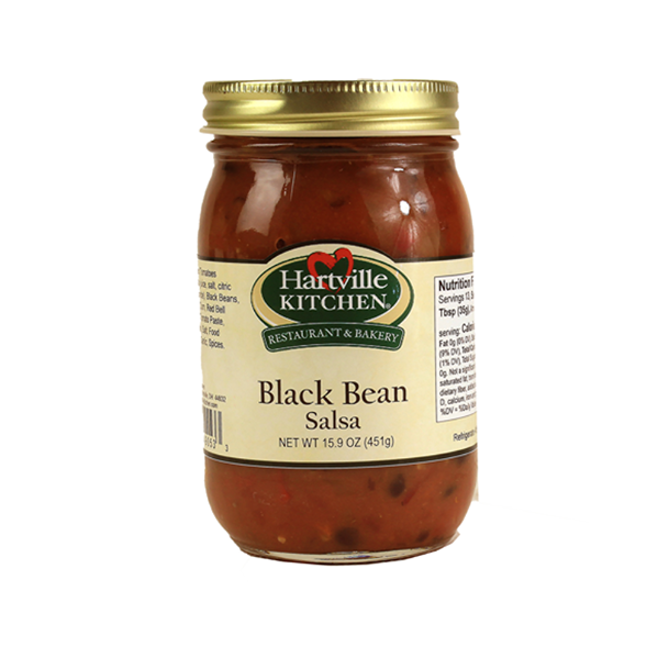 Glass jar of Hartville Kitchen Black Bean Salsa with beige label and gold lid in food and beverage collection