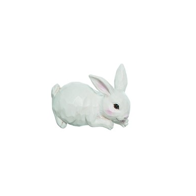 Cream-colored sculpted small bunny figurine lying on tummy for spring decor under $50 collection