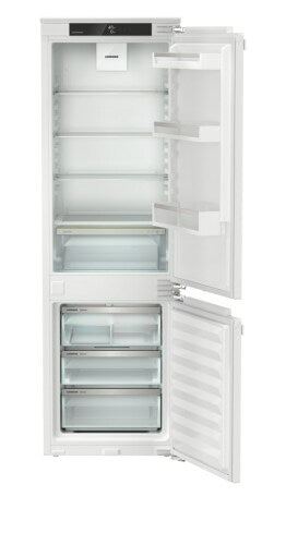 Built-in 24-inch refrigerator and freezer with right hinge, clear shelves, and drawers in Appliances collection