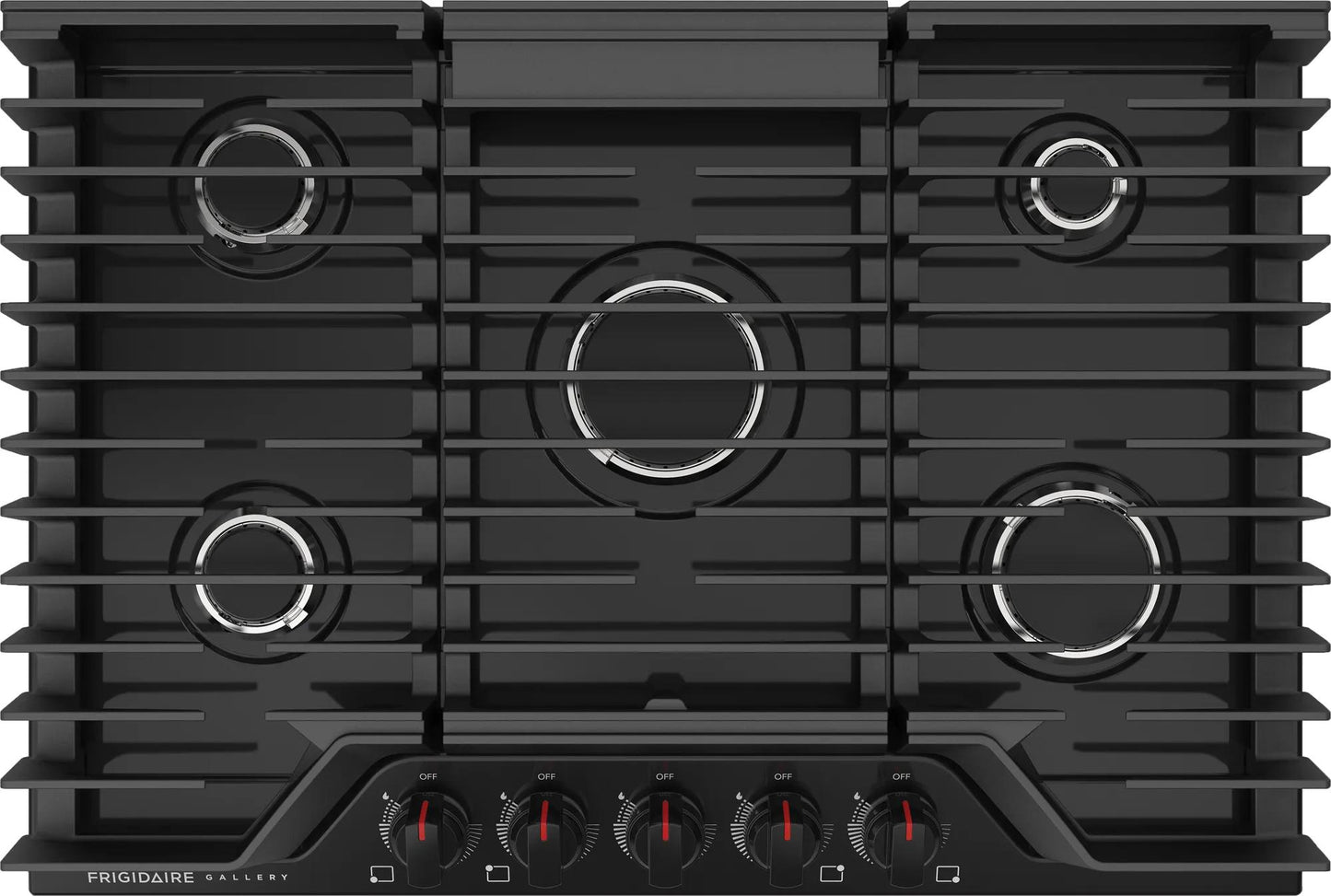 Top view of black five-burner gas cooktop with continuous grates and front control knobs in kitchenware setting