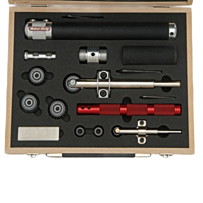 Complete spiralling and texturing tool set with multiple metal attachments in a protective wooden case for woodworking tools collection